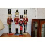 Four festive soldier Nutcracker figures,