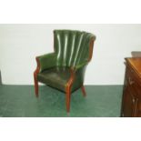 Leatherette armchair with bowed back and studwork