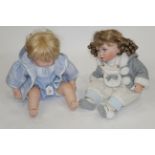 Two porcelain collectible dolls,