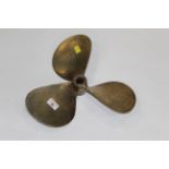 Vintage brass propeller marked to the centre TNR,