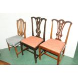 Three mahogany chairs