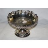 An early 20th century silver plated circular footed fruit bowl with pierced rim,
