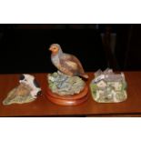 A Border Fine Arts resin model of a Jack Russell and rabbits, 8 cm high,