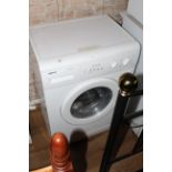 A Beko 9kg A+A class washing machine, 85 cm x 59 cm x 45 cm.