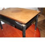 A 1960's hardwood and ebonised coffee table of rectangular form,