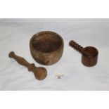 A turned sycamore pestle and mortar, together with a turned wood nut cracker, possibly Laburnum.