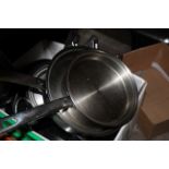 A selection of modern stainless steel cookware, pans etc.