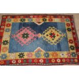 A small Turkish woollen handmade rug,