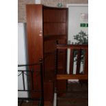 A G Plan teak concave corner cupboard with four tiers, the base section having a concave door,