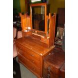 An Edwardian walnut dressing chest,