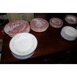 A quantity of red transfer printed pottery tea wares including Myott "Royal Mail", "The Hunter",