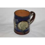 A Doulton Lambeth stoneware Edward VII coronation mug,