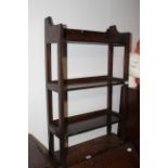 A 1930's oak three tier bookshelf, 56 cm x 20 cm x 90 cm high.