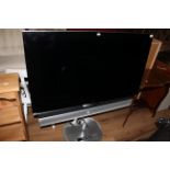 A Bang & Olufsen 40" flat screen TV,