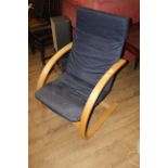 An IKEA Poang armchair, upholstered in blue, 102 cm with seat height of 37 cm.