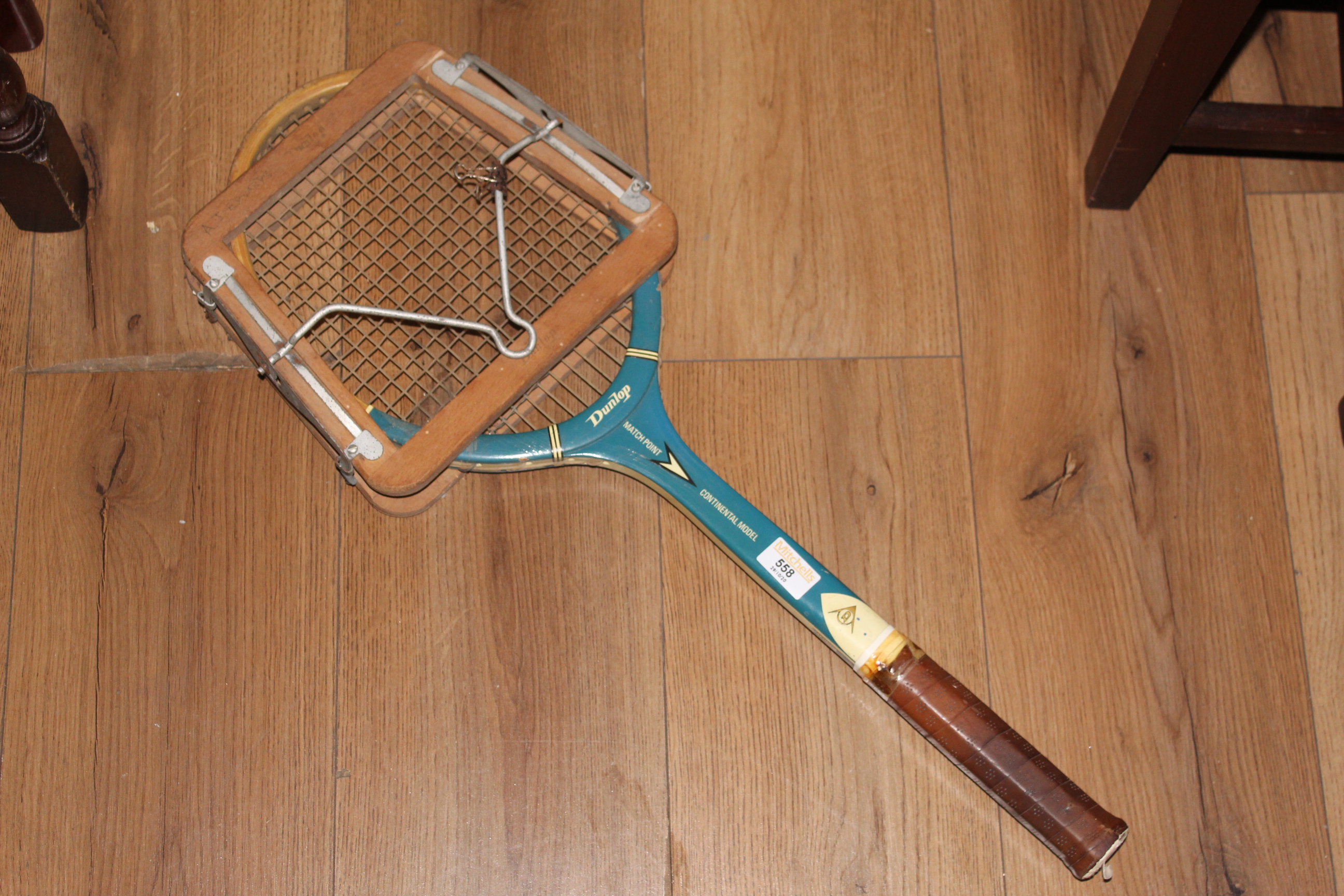 A vintage Dunlop Match Point Continental model medium size tennis racket,