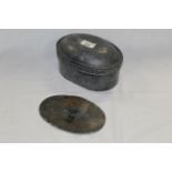 An 18th century domed oval pewter table tobacco box with internal cover,