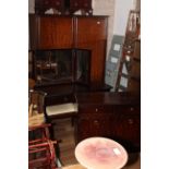 A Stag Minstrel three piece bedroom suite comprising a double door wardrobe,