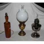 A turned word bottle form electric table lamp, 42 cm high,