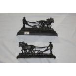 A black painted cast iron fireside flat back figure - "Burns" modelled as a ploughing scene,