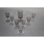 A late 18th century squat ale or cordial glass with clear tapered bowl,