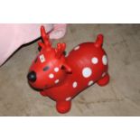 A Happy Hopperz red plastic model deer, 46 cm high.