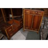 A 1940's walnut veneered utility four piece bedroom suite.