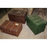 Two late Victorian metal travel trunks and two canvas covered travelling trunks.