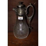 A Victorian cut glass claret jug, with plated mounts, 28 cm high.
