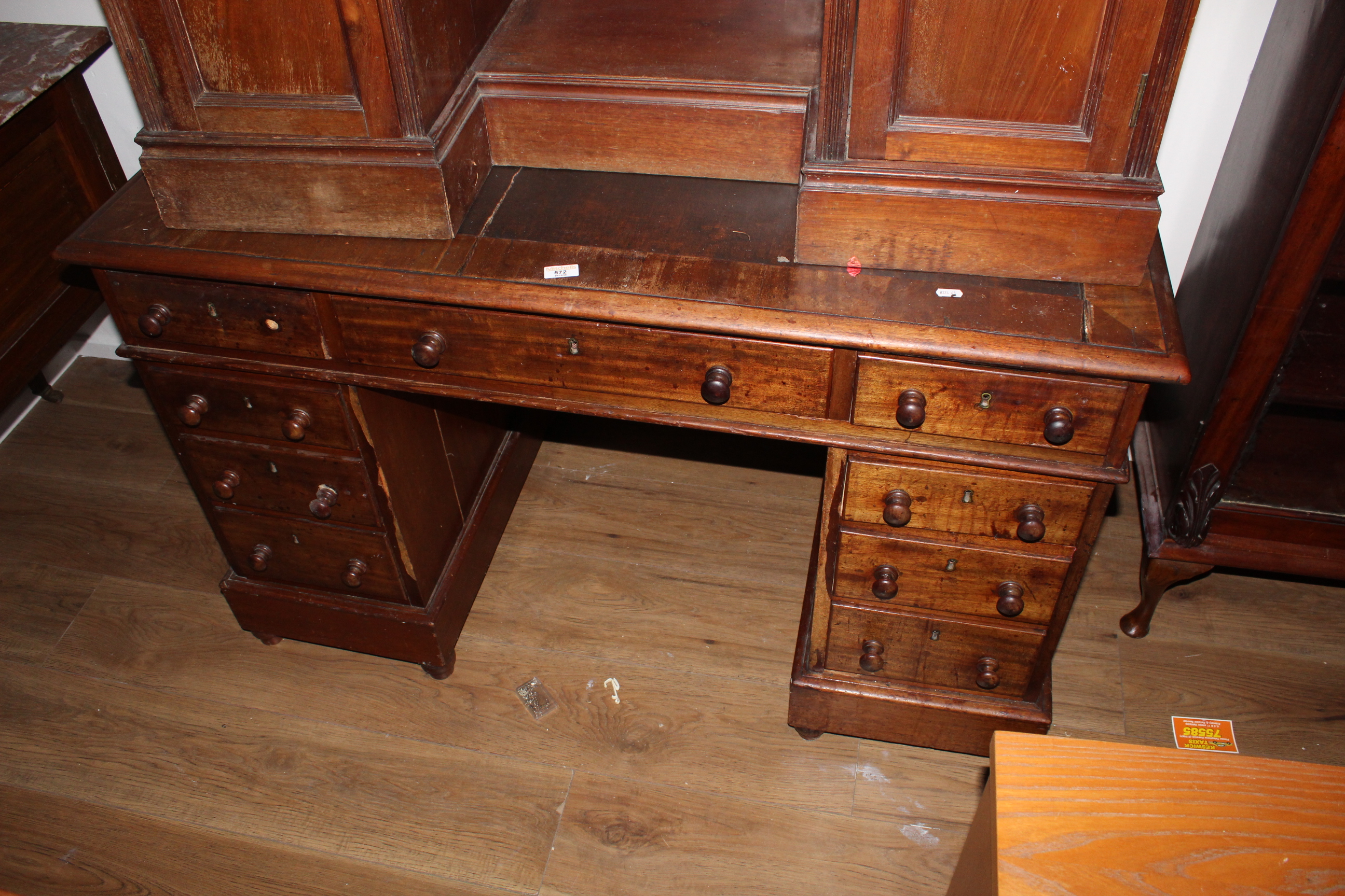 A Victorian mahogany pedestal kneehole desk,