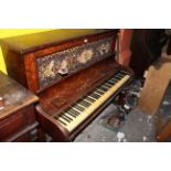 A Victorian walnut upright piano by John Broadwood & Son's,