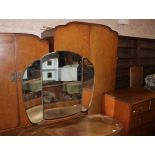 A 1940's figured walnut four piece bedroom suite - 2 wardrobes,