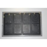A large rectangular chalk board hung with 8 detachable rectangular panels,