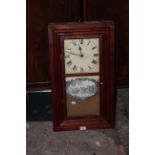 A stained pine rectangular shelf clock of American design, 66 cm high.