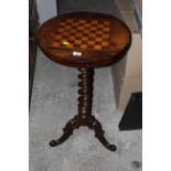 A Victorian rosewood circular occasional games table,