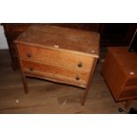 A 1940's light oak utility chest,