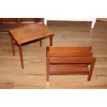 A 1970's Danish teak occasional table, having a rectangular top raised on tapering legs,