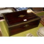 A 19th century brass bound mahogany writing box, with maroon leather lined writing slope,