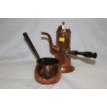 A Victorian copper chocolate pot with flared cylindrical body and side handle, 25 cm,