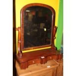 A Victorian design mahogany swing toilet or dressing mirror having an arched mirror plate between