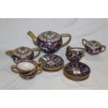 An Italian Majolica lustre tea set comprising a teapot, milk pot, sugar bowl, 6 cups and 6 saucers,