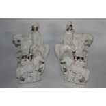 A pair of Victorian Staffordshire pottery figures and a pair of Staffordshire style figures titled