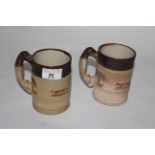 A pair of Denby two tone stoneware hunting mugs, 11 cm high.