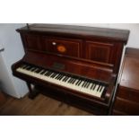An Edwardian inlaid mahogany iron framed upright piano by Kent & Cooper Ltd, Lincoln,