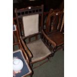 An early 20th century American style rocking chair,