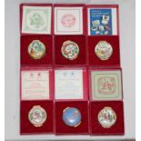 A group of six Halcyon Days Bilston enamel Christmas design circular boxes,