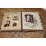 A Victorian photograph album containing various photographic portraits.