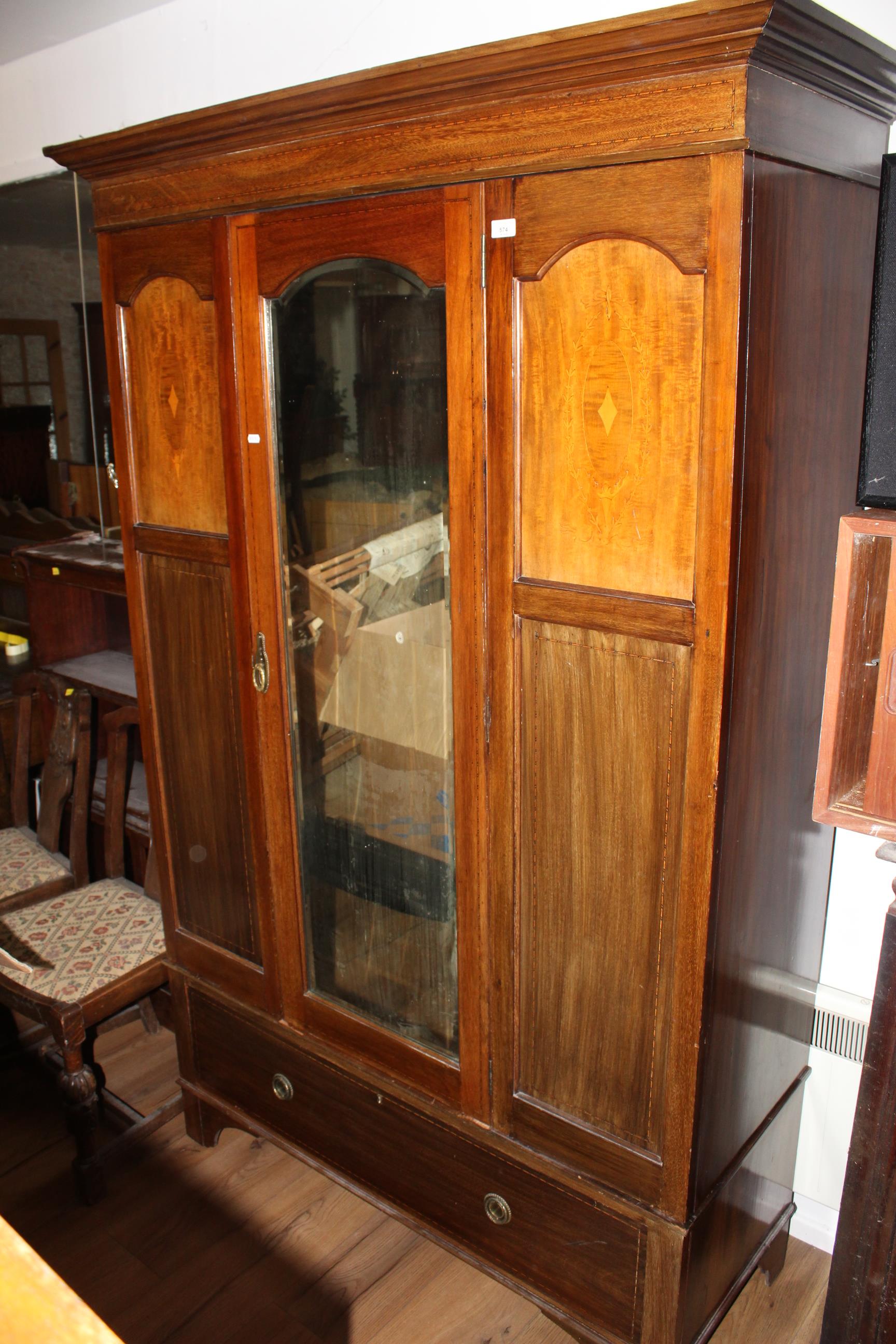 An Edwardian inlaid mahogany mirror door wardrobe,