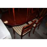 A Caxton mahogany dining room suite, comprising oval extending dining table with one extra leaf,