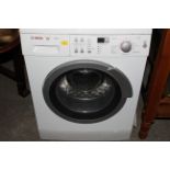 A Bosh Maxx 9 washing machine, 60 cm wide.